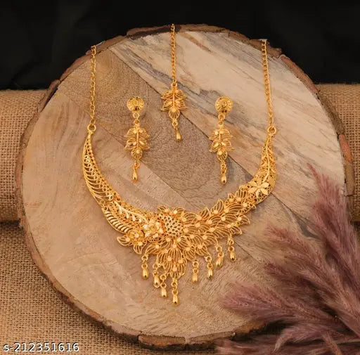 Gilded Radiance: Elevate Your Ethnic Look with the New Trendy Golden Jewellery Set