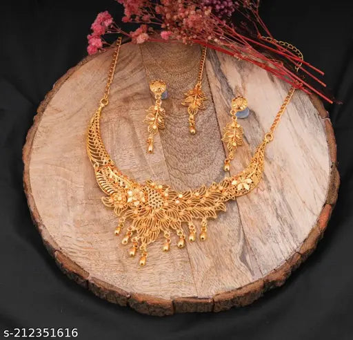 Gilded Radiance: Elevate Your Ethnic Look with the New Trendy Golden Jewellery Set